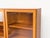High-quality mid-century display cabinet by Omann Jun from the 1960s. Teak-veneered body with solid teak and glass doors....