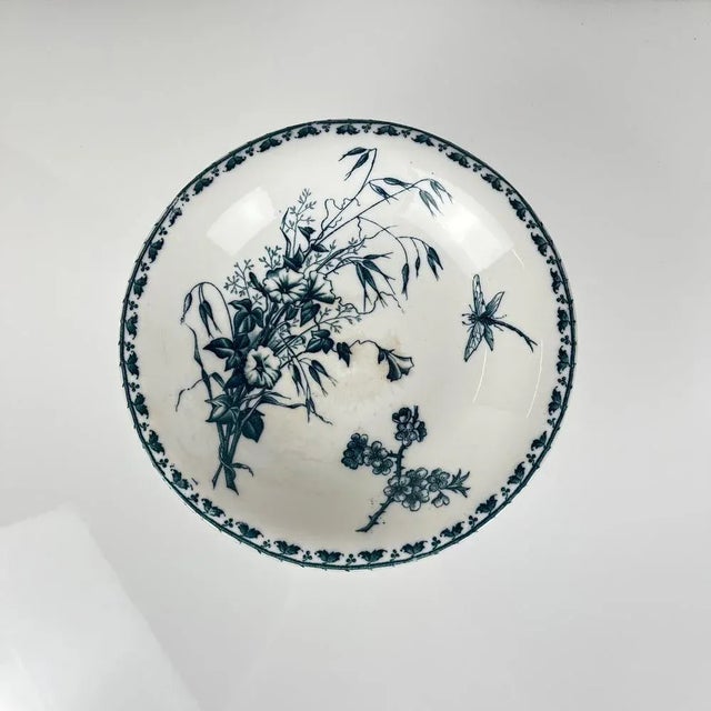 "Carmen" fruit bowl, Sarreguemines, circa 1879 to 1918 Blue, iron earth colors Floral decoration with insects: dragonfly,...