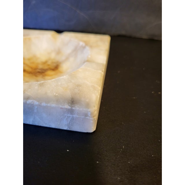 Vintage circa 1970s marble ashtray catchall with beautiful veining and textured channel edge finish.