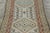 Made with hand-knotted wool circa 1890-1910, this 3x16 antique Persian Sarab extra-long runner enjoys a classic geometric...
