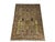 This Sultani wool rug features a pineapple and floral design on a warm gray field. Burgundy, gold, cream and muted blue...