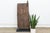 From the Bandiagara escarpment region of Mali, this two-plank granary or shrine door is carved with stacked bands of...