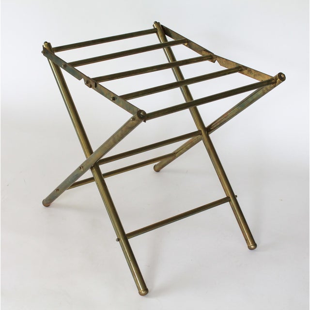 Vintage brass folding luggage rack. Partial makers mark. Made in Taiwan. Some age wear / patina.