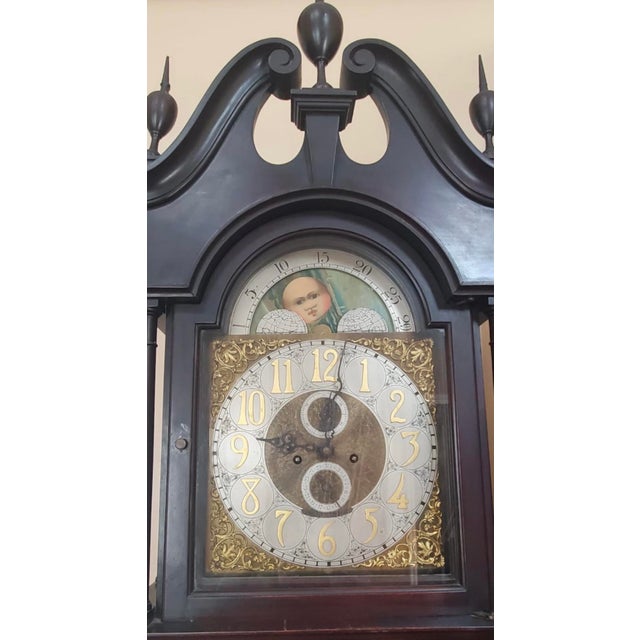 It shows a classic and elegant Victorian style, with a pinch-waist mahogany case, and decorative columns. The bonnet has a...