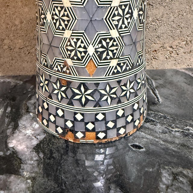 For your consideration, a vintage wood hand drum, also known as a darbuka, doumbek, or goblet drum, featuring intricate...