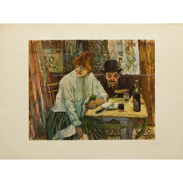 An excellent vintage full color Impressionist print after oil painting "At the Café La Mie" by Toulouse-Lautrec. Comes...