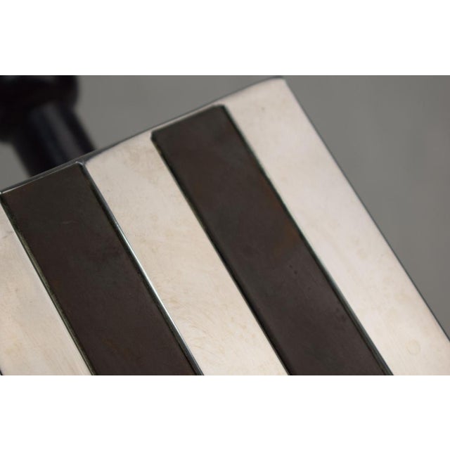 Italian table lamp from the 1970s, featuring a minimalist, geometric design typical of the modernist taste of the period....