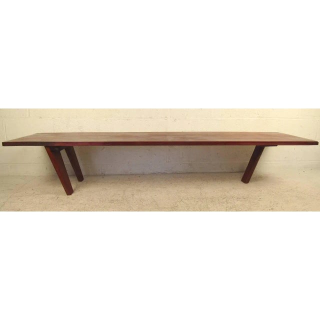 Beautiful Midcentury coffee table designed and inscribed by artist Robert Jay Lawrence in 1959. Unusual three leg...