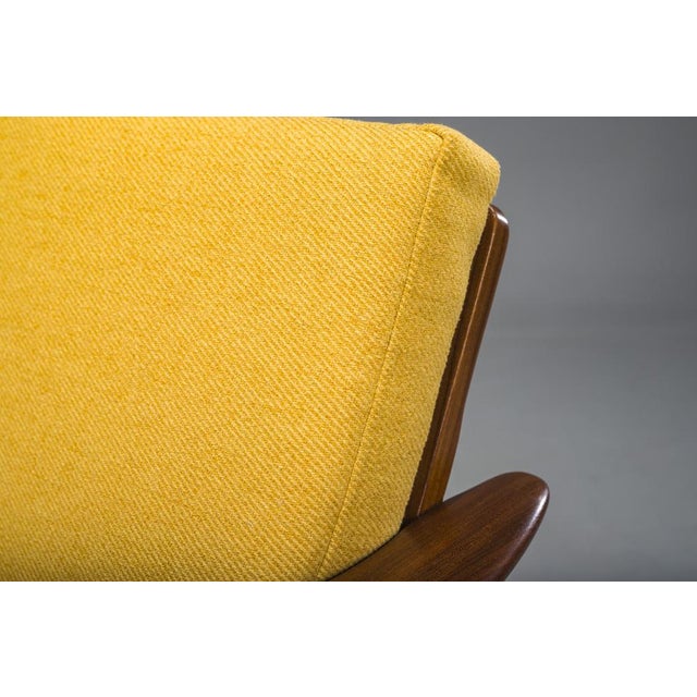 Step back in time with this beautifully restored lounge chair, inspired by the iconic Scandinavian designs of the 1960s....