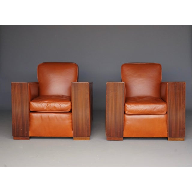 Impressive pair of large Art Deco armchairs. Circa 1940s. These stylish armchairs were fully refurbished around the 1990s...