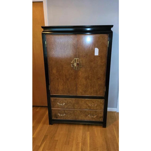 Vintage Century Furniture Asian Style entertainment armoire cabinet. Black lacquer or ebonized maple and burl ash from...
