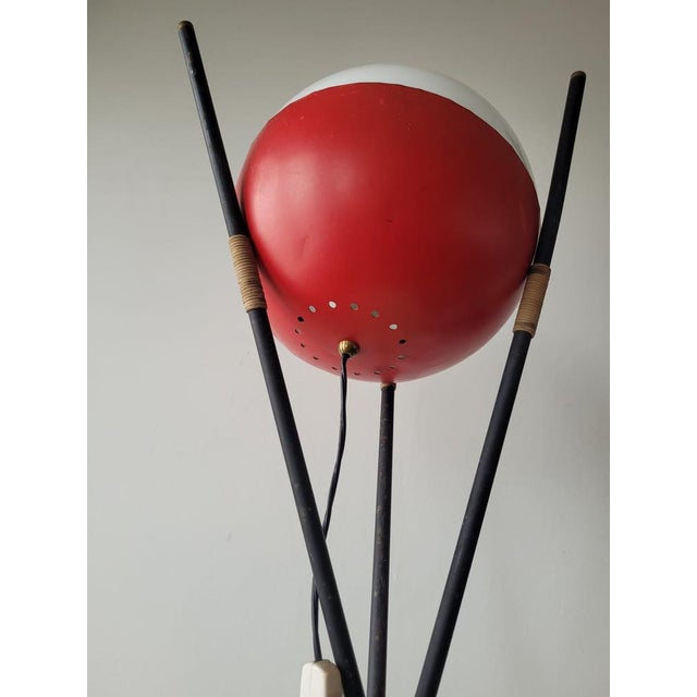 This rare floor lamp represents a pinnacle of 1950s Italian design, born from the creative genius of Angelo Brotto for the...