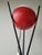 This rare floor lamp represents a pinnacle of 1950s Italian design, born from the creative genius of Angelo Brotto for the...