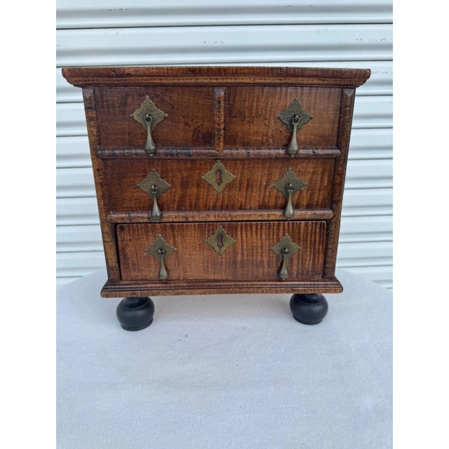 Georgian style curly maple bowfront chest of drawers, Crafted in rich, aged curly maple, it features elegant curved front...