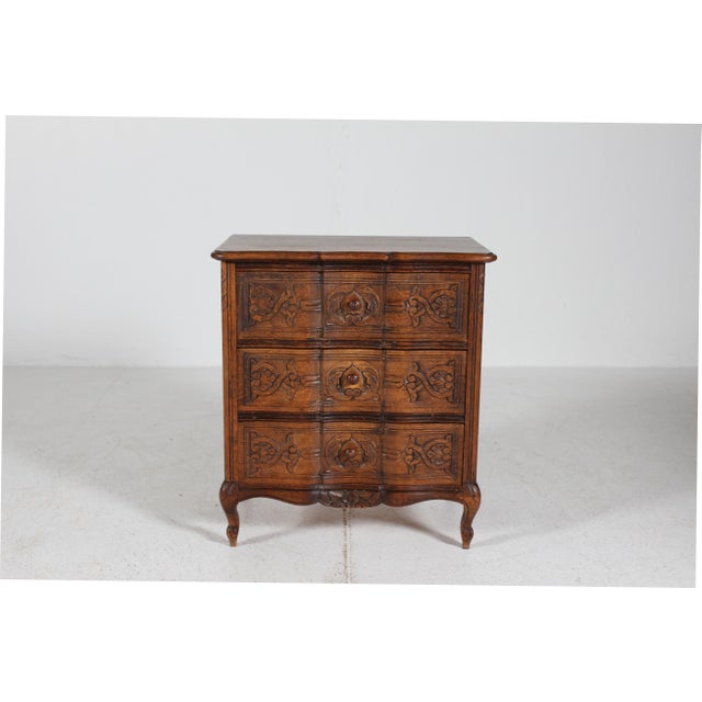 Small rococo style curved front chest of drawers made by skilled danish cabinetmakers in Denmark in the 1940s. This...