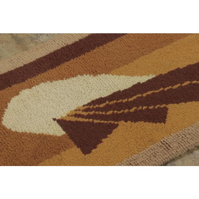 This 2x4 antique runner is an exciting new addition to Rug & Kilim’s Antique collection—an Art Deco folk-art masterpiece...
