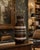 A substantial handcrafted wooden vase decorated with elaborate geometric bands of mother-of-pearl and iridescent natural...
