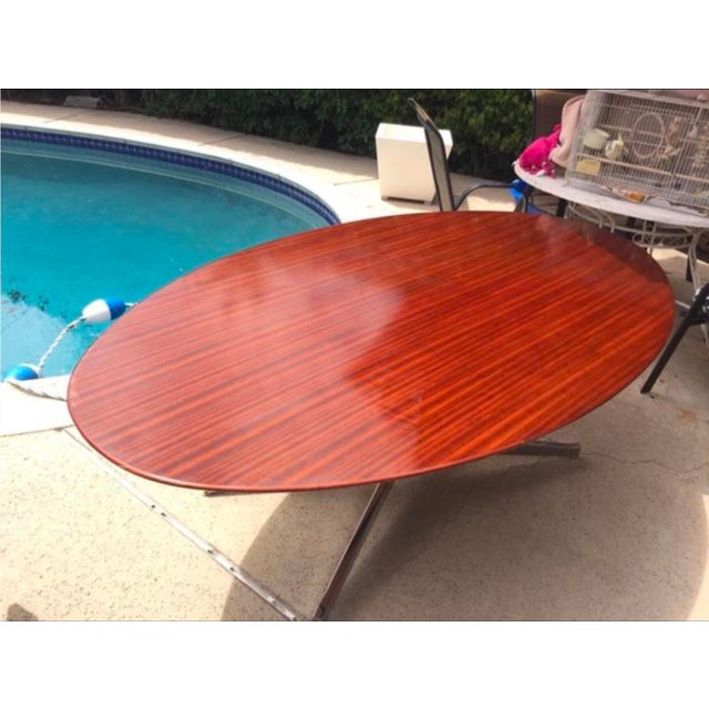 This elegant dining table is a perfect addition to any room. Crafted by STOW & DAVIS, it features a beautiful oval shape...