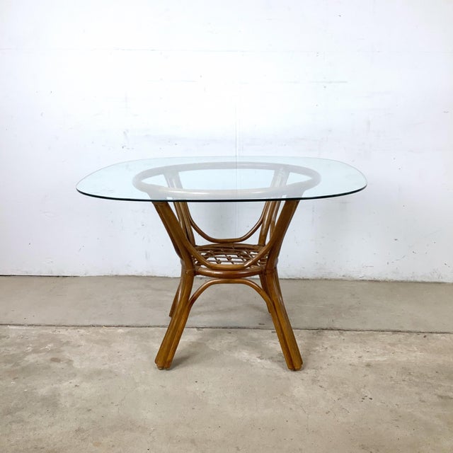 This is exactly the kind of table that makes a dining room. A beautifully constructed vintage rattan dining table from the...