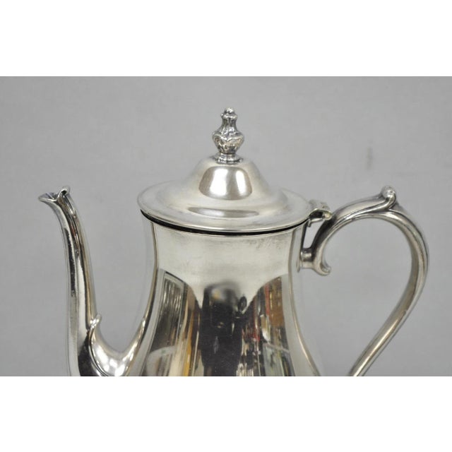 Vintage International Silver Co Silver Plated Victorian Teapot Coffee Pot. Circa Mid 20th Century. Measurements: 10" H x...