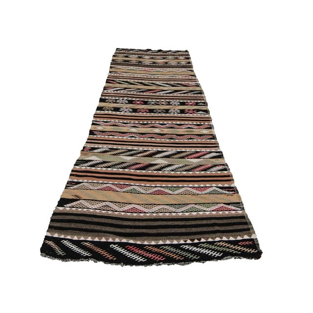 Vintage handwoven kilim rug from Denizli region of Turkey. Approximately 50-60 years old. In very good condition.