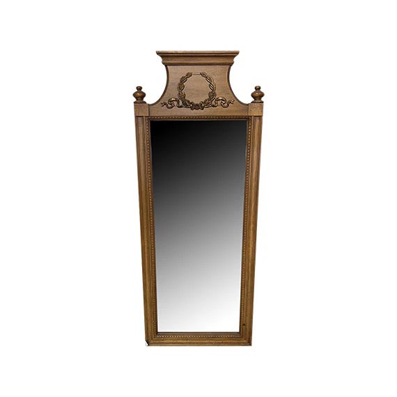 This beautiful mirror would make a great addition to any room.