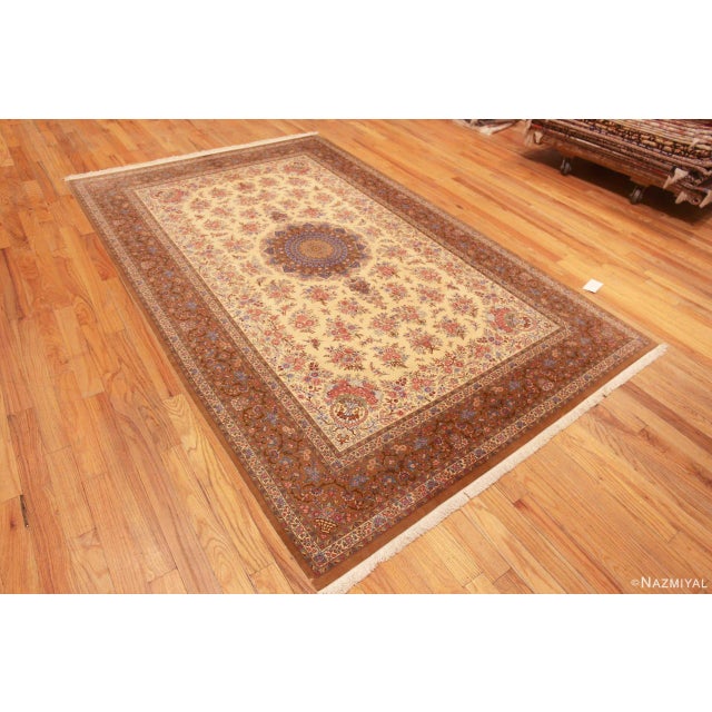 Luxurious Fine Ivory Vintage Persian Silk Floral Gonbad Design Qum Rug, country of origin: Persian Rugs, Circa date: Vintage