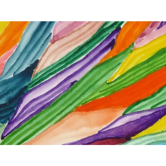 Transfixing and vivid watercolor of abstract striated colors, rolling together like leaves in the wind or waves of sand...