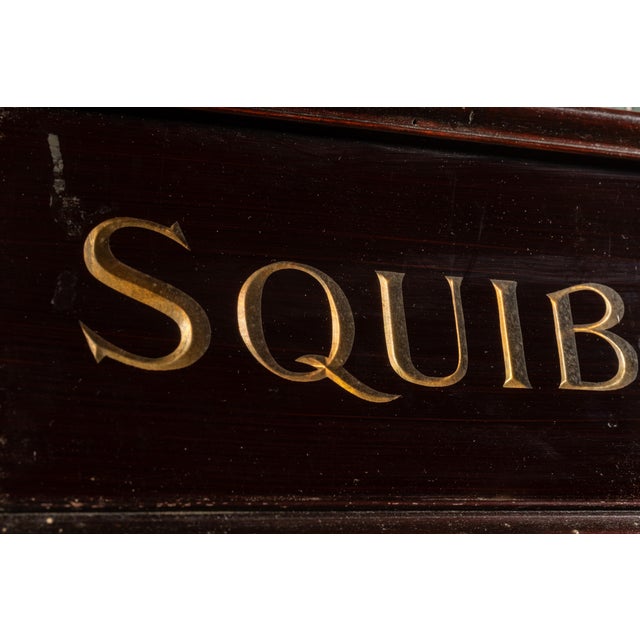 Early 20th-century drugstore display sign produced for E.R. Squibb & Sons of Brooklyn, New York, the pharmaceutical...