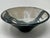 Vintage 1980s abstract studio pottery bowl, black and white glaze on gray-taupe clay. Dimensions: 9.75"diameter x 4"high.