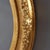 This elegant oversized antique Victorian gilt wood oval frame, dating from circa 1890, exemplifies the decorative grandeur...