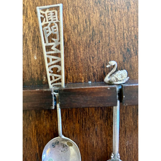 Acquired from a well traveled San Francisco estate, this set of 40 vintage collectors spoons (as well as a few forks and...
