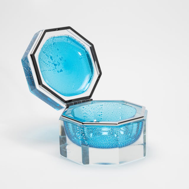 Hand-Blown Murano Box in Aqua Blue with Silver Flecks and Chrome Fittings captures the essence of Venetian artistry...