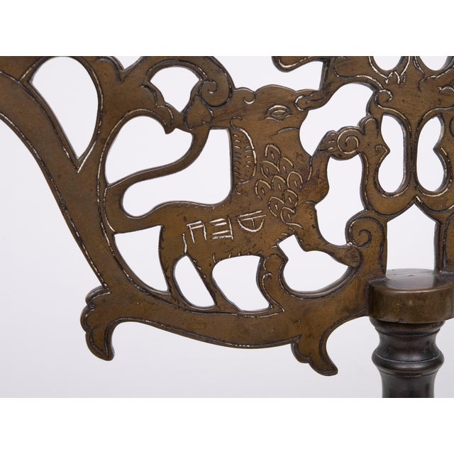 Ca. 1900 large impressive bronze five-branched Shabbat candelabras , probably Germany . Decorated in openwork with Judah...