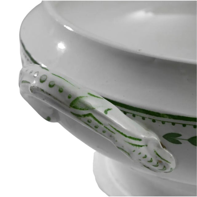 This 1900s Belgian Porcelain Tureen from Boch Frères La Louvière is a delightful blend of simplicity and elegance. Crafted...