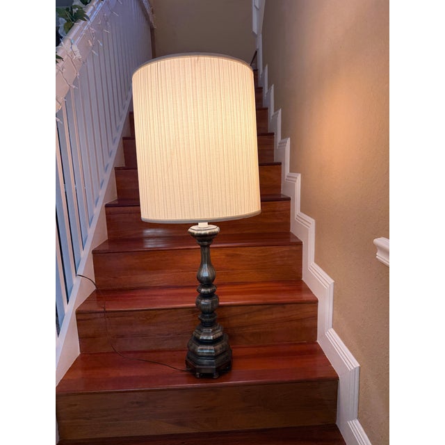 This monumental 41-inch mid-century table lamp seamlessly embodies the glamorous weight and scale of Hollywood Regency...