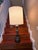 This monumental 41-inch mid-century table lamp seamlessly embodies the glamorous weight and scale of Hollywood Regency...