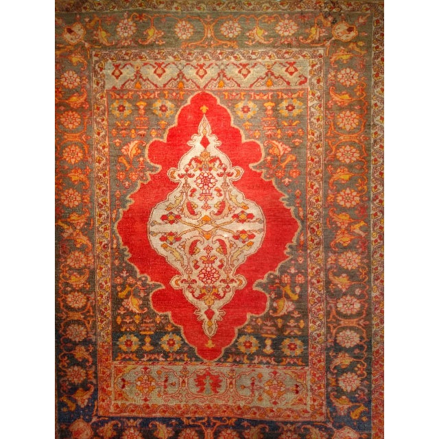 This 19th century Turkish Oushak from the fourth quarter of the 1800s is a piece of the late Victorian era of Anatolian...