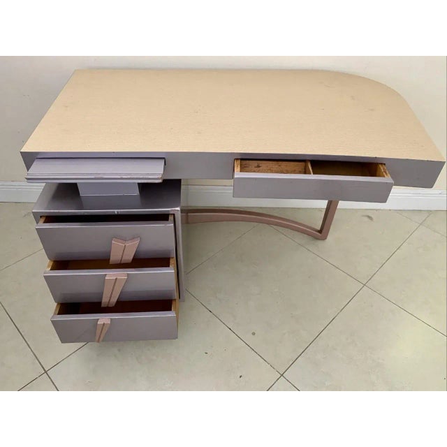 This funky desk would make a perfect anchor piece for any mid mod office!