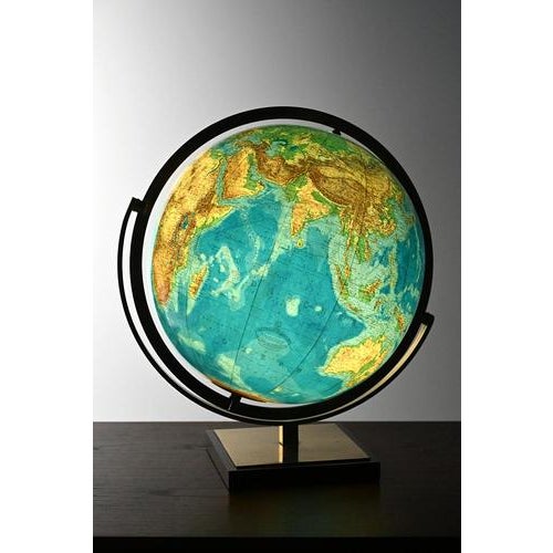 Columbus Duo globe made of glass in a brass frame and with wood veneer base. Can also be used as a table lamp in your...