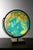 Columbus Duo globe made of glass in a brass frame and with wood veneer base. Can also be used as a table lamp in your...