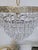 Metal Vintage Hollywood Regency loral Embossed Brass Tiered Waterfall "Wedding Cake" Crystal Chandelier For Sale - Image 7 of 8