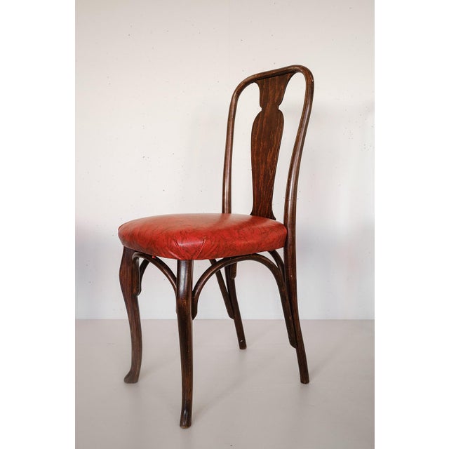 Set of 4 beautiful and rare Horgen Glarus chairs model “Glaris” from 1915. Maple wood and vinyl. Original mark and label....