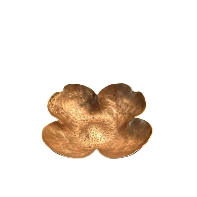 A charming, vintage copper dogwood blossom/ clover dish. Features a handmade, hammered copper dish in the form of a...