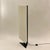 Rare "Accademia" floor lamp by Cini Boeri, produced by Artemide in Italy around 1978. A triangular structure covered in...