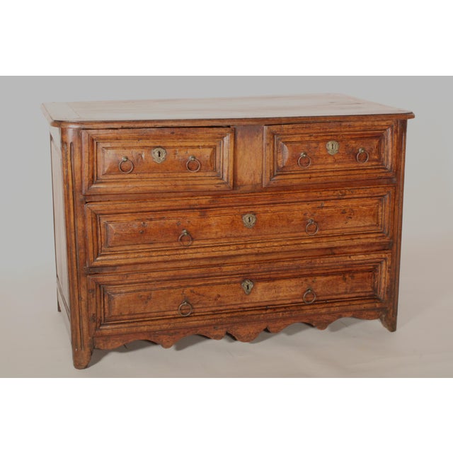 Louis XVI provincial oak chest of drawers, 18th century. With a two board top with rounded front corners, two top drawers...