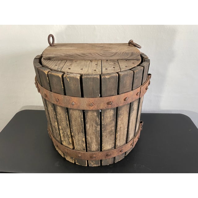 This is an antique wooden basket for a wine press, brought to the US from Italy. It has been repurposed as a small side...