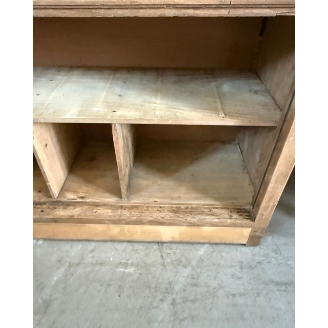 A superb antique tradesman's counter dating from the first half of the 20th century. With its beautiful natural patina,...