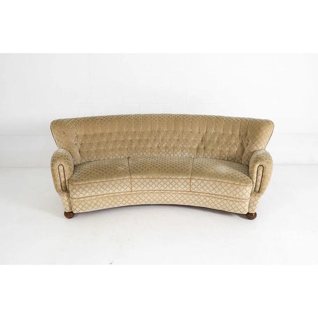 This is simply one cool sofa. It boasts a Danish art deco design and is upholstered in a wavy diamond mohair/velour type...