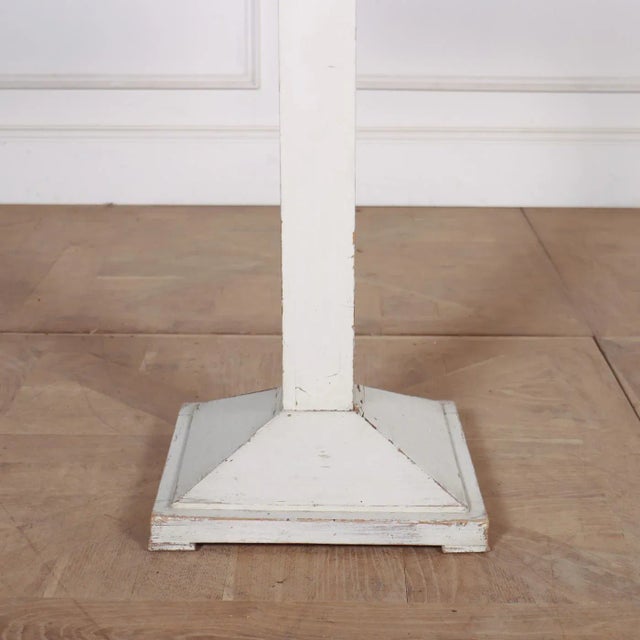 19th Century Swedish painted oval top pedestal table. 1880. This piece is designed in the style of the selected designer...